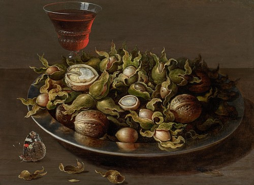 Osias Beert The Elder - Still life of a pewter plate of hazelnuts and walnuts, a facon-de-Venise glass of red wine and a Red Admiral butterfly (Vanessa atalanta) on a table top