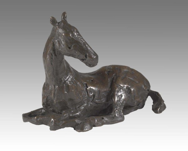 Small sitting down horse
