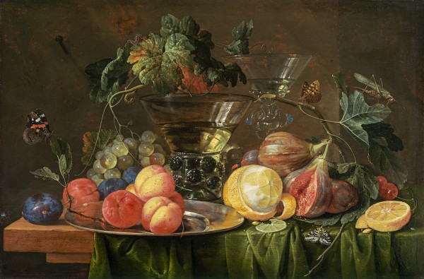 Still life of plums, grapes, figs, a peeled lemon and other fruit on a ledge, with glasses, a green cloth and butterflies