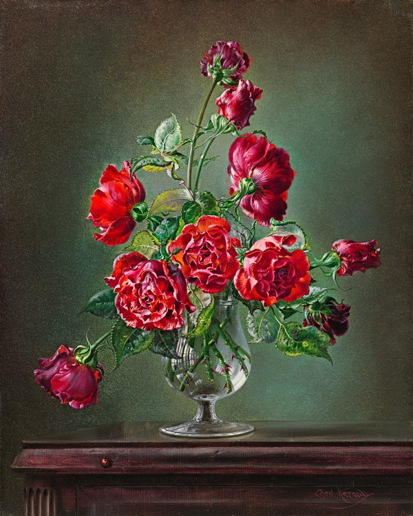Crimson Glory roses in glass