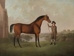 Charles Towne - Mr Thomas Ewart's bay racehorse held by a trainer in the grounds of his country house, Everton