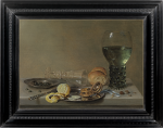 Willem Claesz Heda - A still life of a rummer of white wine, a mother-of-pearl inlaid knife, a gilt-brass clockwatch with a blue ribbon, a pewter plate with capers, a peeled lemon and a façon-de-Venise wineglass on a table