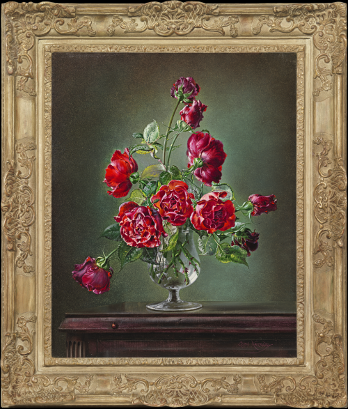 Crimson Glory roses in glass