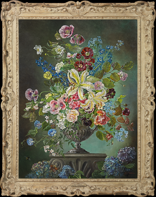 Silvery urn of mixed flowers